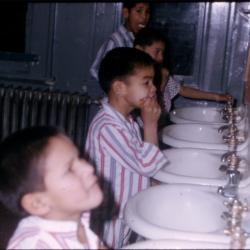 Photographs of boys in the dormitory at Lejac Indian Residential School