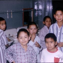 Photographs of boys in the dormitory at Lejac Indian Residential School