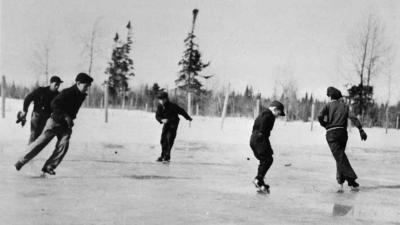 Photograph of boys skating outside