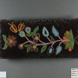 Floral beaded cushion