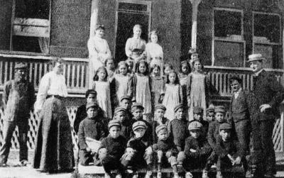 Photograph of students and staff, first boarding school in Moose Fort Ontario