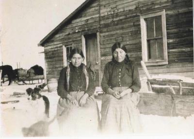 Photograph of two women sitting outside