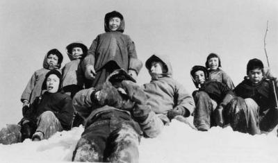 Photograph of boys playing outside