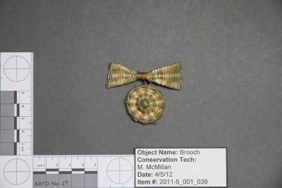 Woven bow brooch