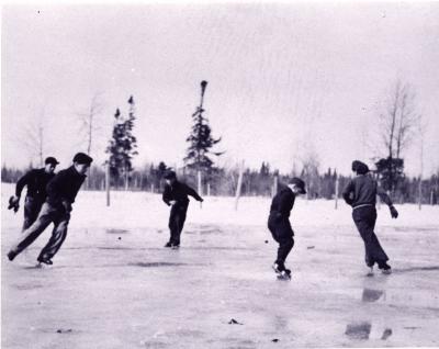 Photograph of boys skating outside