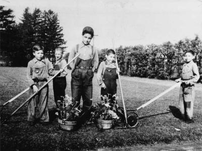 Photograph of students working in the garden