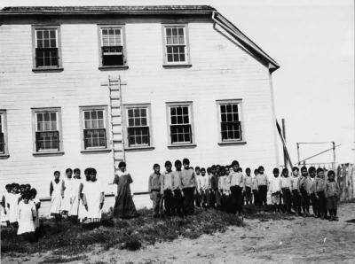 Photograph of students lined up outside