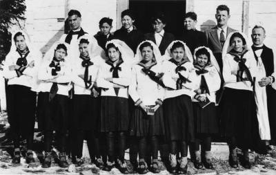 Photograph Bishop Sovereign and Principal, Rev. N. Middleton with a confirmation class