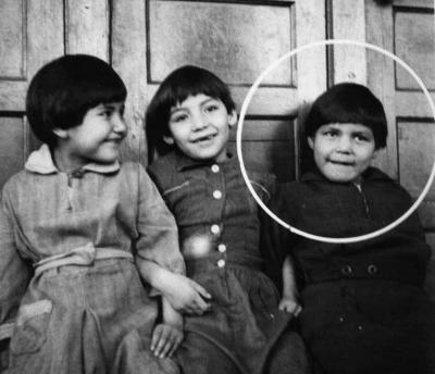 Photograph of three junior students who had just lost baby teeth