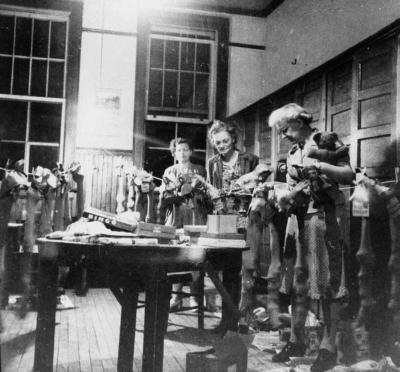 Photograph of staff filling Christmas stockings