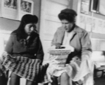 Photograph of women weaving handicrafts