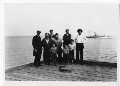 Photograph of a group of people on a dock in Cape Croker