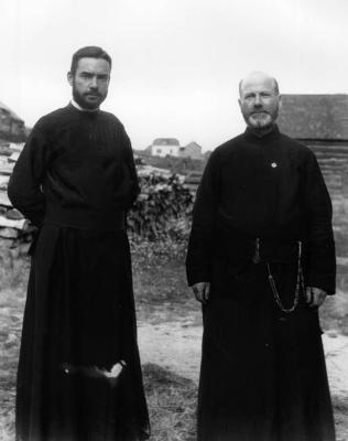 Photograph of two clergy members in Cape Croker