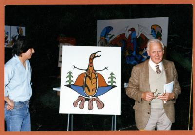 Photograph of Jesse Agawa and the rising crane painting