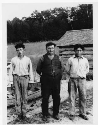 Photograph of three people in Cape Croker