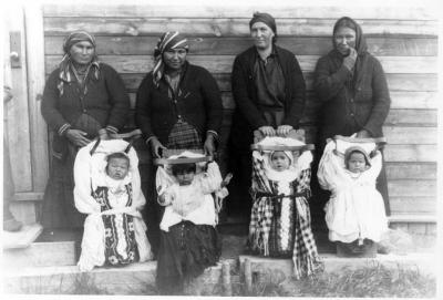 Photograph of four mothers and their children at Fort Albany