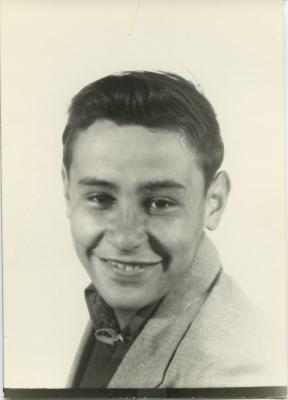 Photographs of a boy in a suit jacket at Spanish