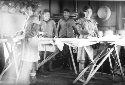 Photograph of students ironing