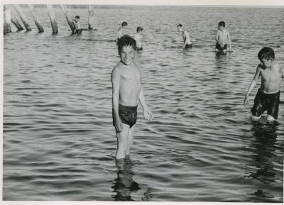 Photographs of male students and outdoor activities