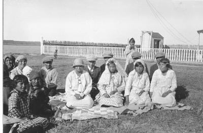 Photograph of four brides with their grooms outside of HBC