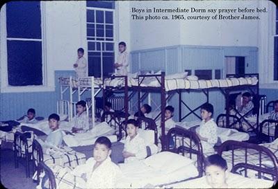 Photographs of junior and senior boys getting ready for bed