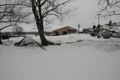 Photographs of tipi and outdoor sculpture in winter